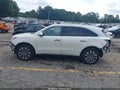 2014 Acura MDX — photo 14 of 16 | VIN 5FRYD4H63EB034500