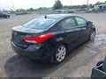 2012 Hyundai Elantra — photo 4 of 11 | VIN KMHDH4AE5CU424018