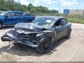 2022 Tesla Model Y — photo 2 of 17 | VIN 7SAYGDEF2NF451719
