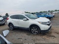 2018 Honda CR-V — photo 13 of 16 | VIN 2HKRW2H57JH653477