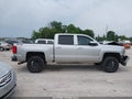 2018 Chevrolet Silverado 1500 — photo 13 of 16 | VIN 3GCUKREC0JG501907