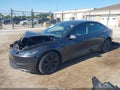 2025 Tesla Model 3 — photo 2 of 15 | VIN 5YJ3E1EB1SF902174
