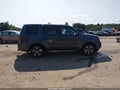 2013 Honda Pilot — photo 13 of 16 | VIN 5FNYF4H58DB073889