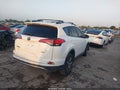 2018 Toyota RAV4 — photo 4 of 15 | VIN JTMWFREV3JD113467