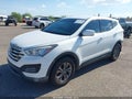 2014 Hyundai Santa Fe — photo 2 of 17 | VIN 5XYZT3LB6EG167221