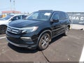 2016 Honda Pilot — photo 2 of 16 | VIN 5FNYF5H50GB026530
