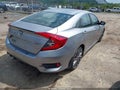 2019 Honda Civic — photo 4 of 19 | VIN 19XFC2E89KE015389