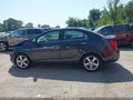 2015 Chevrolet Sonic — photo 14 of 16 | VIN 1G1JE5SB9F4101100