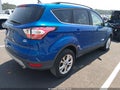 2018 Ford Escape — photo 4 of 18 | VIN 1FMCU9H98JUC14586