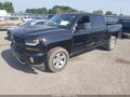 2018 Chevrolet Silverado 1500 — photo 2 of 16 | VIN 3GCUKREC6JG106811
