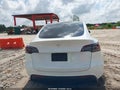 2024 Tesla Model Y — photo 15 of 15 | VIN 7SAYGDEDXRF097291