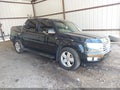 2014 Honda Ridgeline — photo 1 of 16 | VIN 5FPYK1F55EB003076