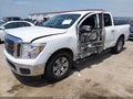 2018 Nissan Titan — photo 2 of 16 | VIN 1N6AA1EK4JN543354