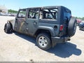 2014 Jeep Wrangler Unlimited — photo 3 of 10 | VIN 1C4BJWKG5EL149979