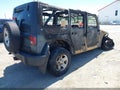 2014 Jeep Wrangler Unlimited — photo 4 of 10 | VIN 1C4BJWKG5EL149979