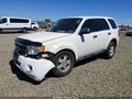 2009 Ford Escape — photo 2 of 17 | VIN 1FMCU927X9KC97498