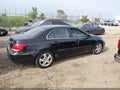 2007 Acura RL — photo 13 of 16 | VIN JH4KB16697C003782