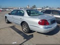 2001 Lincoln Continental — photo 3 of 11 | VIN 1LNHM97V31Y602242