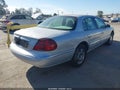 2001 Lincoln Continental — photo 4 of 11 | VIN 1LNHM97V31Y602242