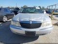 2001 Lincoln Continental — photo 6 of 11 | VIN 1LNHM97V31Y602242