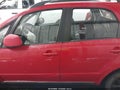 2010 Suzuki SX4 — photo 13 of 15 | VIN JS2YA5A37A6300967