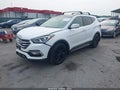 2018 Hyundai Santa Fe — photo 2 of 18 | VIN 5XYZWDLA3JG529682