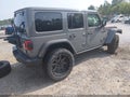2022 Jeep Wrangler Unlimited — photo 4 of 16 | VIN 1C4HJXFG4NW161419