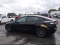 2021 Tesla Model 3 — photo 13 of 17 | VIN 5YJ3E1EA9MF094005