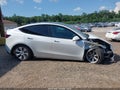 2023 Tesla Model Y — photo 12 of 15 | VIN 7SAYGAEE2PF591181