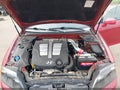 2006 Hyundai Tiburon — photo 10 of 16 | VIN KMHHN65F36U220895
