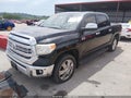 2015 Toyota Tundra — photo 2 of 16 | VIN 5TFAW5F15FX455426