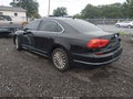 2016 Volkswagen Passat — photo 3 of 16 | VIN 1VWBT7A30GC025410