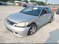 2004 Honda Civic — photo 2 of 11 | VIN 1HGEM22994L074878