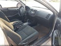 2004 Honda Civic — photo 5 of 11 | VIN 1HGEM22994L074878