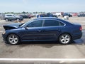 2013 Volkswagen Passat — photo 14 of 18 | VIN 1VWBP7A39DC151037