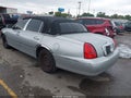 2002 Lincoln Town Car — photo 3 of 16 | VIN 1LNHM81W32Y614453