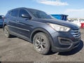 2016 Hyundai Santa Fe — photo 1 of 16 | VIN 5XYZTDLB5GG322057