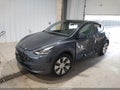 2023 Tesla Model Y — photo 2 of 15 | VIN 7SAYGDEE1PA032302