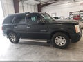 2006 Cadillac Escalade — photo 13 of 16 | VIN 1GYEK63N66R146363