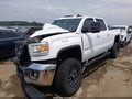 2015 GMC Sierra — photo 2 of 18 | VIN 1GT12YE89FF667635
