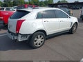 2013 Cadillac SRX — photo 4 of 15 | VIN 3GYFNAE38DS540712