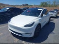 2024 Tesla Model Y — photo 2 of 20 | VIN 7SAYGDED5RF105281