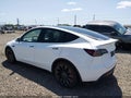 2022 Tesla Model Y — photo 3 of 11 | VIN 7SAYGDEF6NF407013