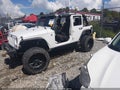 2013 Jeep Wrangler Unlimited — photo 2 of 17 | VIN 1C4BJWDG4DL632861