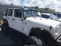 2013 Jeep Wrangler Unlimited — photo 6 of 17 | VIN 1C4BJWDG4DL632861