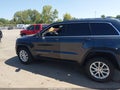 2016 Jeep Grand Cherokee — photo 14 of 16 | VIN 1C4RJFAG2GC462488