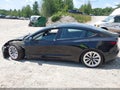 2021 Tesla Model 3 — photo 14 of 16 | VIN 5YJ3E1EB4MF990639