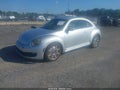 2012 Volkswagen Beetle — photo 2 of 16 | VIN 3VWJP7AT2CM639724