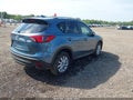 2016 Mazda CX-5 — photo 4 of 17 | VIN JM3KE2CY0G0788531