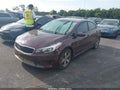 2018 Kia Forte — photo 2 of 16 | VIN 3KPFL4A70JE244132